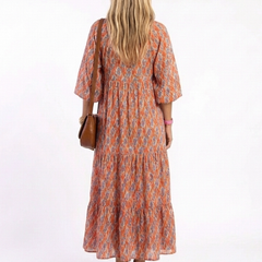 Amara | Geometric Print V Neck Tiered Midi Dress